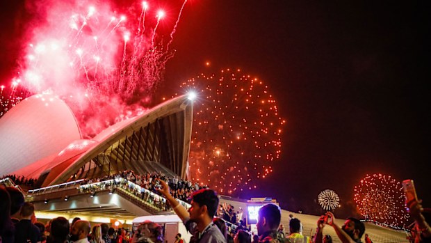 Fireworks explode over the Sydney Harbour Bridge and Sydney Opera House during the midnight display during New Year's Eve celebrations on January 01, 2020 in Sydney, Australia