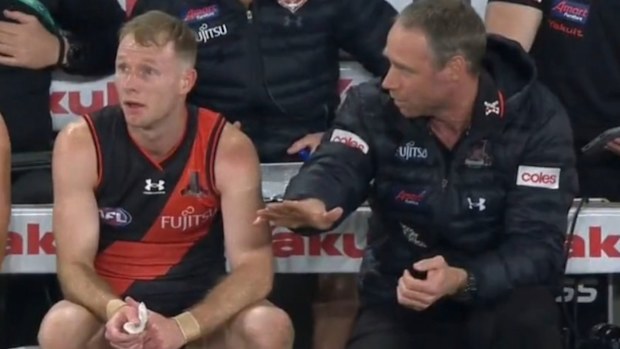 Nick Hind and Essendon coach Ben Rutten