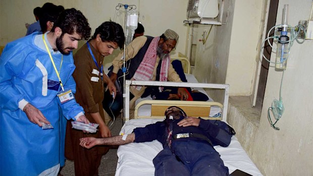 Injured victims of a bomb blast are treated at a hospital in Quetta, Pakistan.