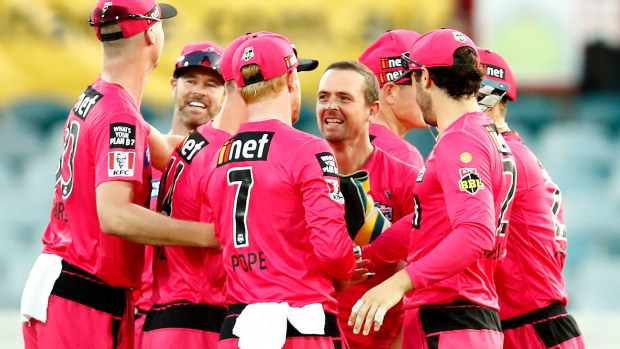Stephen O'Keefe of the Sixers celebrates the wicket of Alex Hales of the Thunder during the Big Bash League match between the Sydney Thunder and the Sydney Sixers