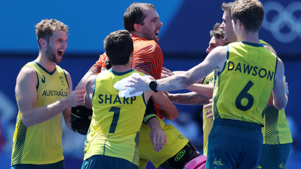 Andrew Lewis Charter, Joshua Beltz, Lachlan Thomas Sharp and Matthew Dawson of Team Australia and teammates celebrate after winning the penalty shootout after the Men's Quarterfinal match between Australia and Netherlands on day nine of the Tokyo 2020 Olympic Games at Oi Hockey Stadium on August 01, 2021 in Tokyo, Japan. (Photo by Naomi Baker/Getty Images)