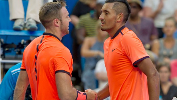Nick Kyrgios (right) congratulates Jack Sock on his victory at the Hopman Cup in Perth. (AFP)