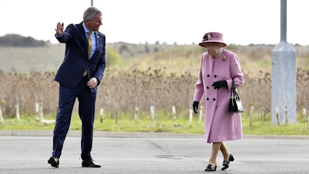 Britain's Queen Elizabeth II arrives for a visit to the Defence Science and Technology Laboratory (DSTL) at Porton Down, England, Thursday Oct. 15, 2020, to view the Energetics Enclosure and display of weaponry and tactics used in counter intelligence