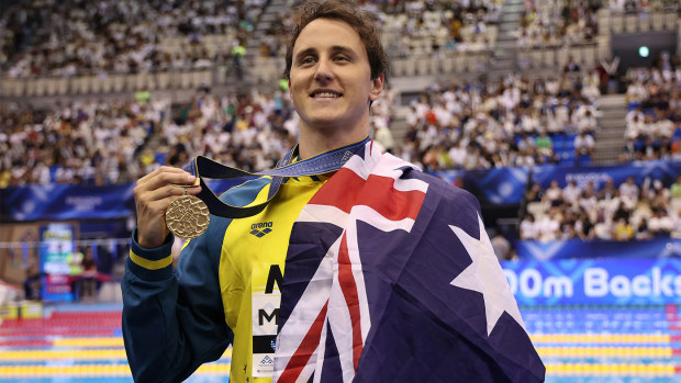A beaming Cameron McEvoy after becoming a world champion.
