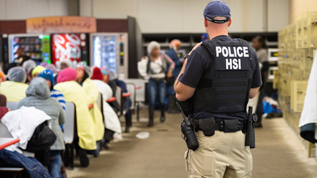 A handout photo made available by the US Department of Homeland Security showing US Immigration and Customs Enforcement (ICE) Homeland Security Investigations (HSI) executing multiple federal criminal search warrants