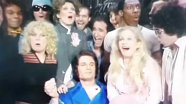 Saturday Night Live cast members alternately laughed or gasped as Charles Rocket (bottom centre) uttered the f-word on live TV.