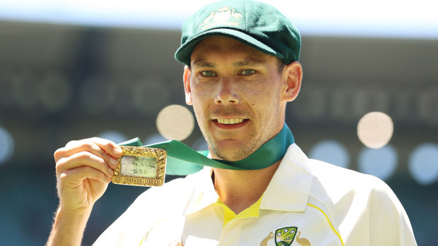 Scott Boland of Australia poses with the Johnny Muller medal after winning and retaining the Ashes on day three of the Third Test match 