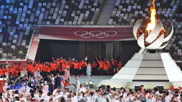 Members of Team Japan enter the stadium during the Closing Ceremony of the Tokyo 2020 Olympic Games