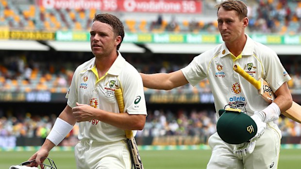 Marcus Harris of Australia and Marnus Labuschagne of Australia walk off the field