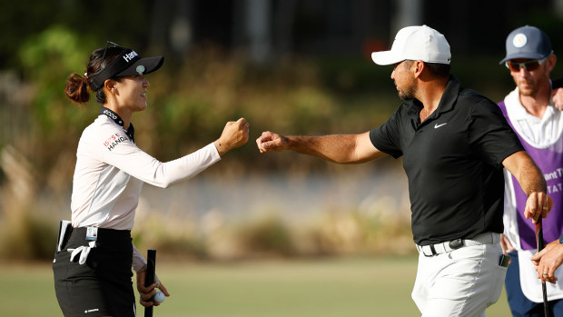 Lydia Ko of New Zealand and Jason Day of Australia celebrate a birdie on the 17th green during the final round of the Grant Thornton Invitational at Tiburon Golf Club on December 10, 2023 in Naples, Florida. (Photo by Cliff Hawkins/Getty Images)