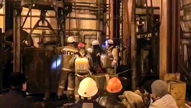 Rescue teams on Sunday found the bodies of nine construction workers who had been trapped inside a burning potash mine in Russia