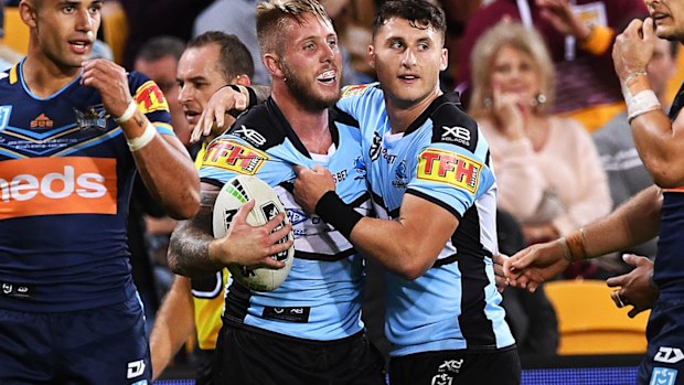 Sharks edge out Titans