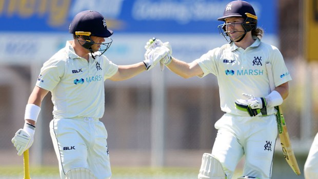 (L-R) Marcus Harris of Victoria is congratulated by William Pucovski of Victoria after getting out for 239 during day three of the Sheffield Shield match