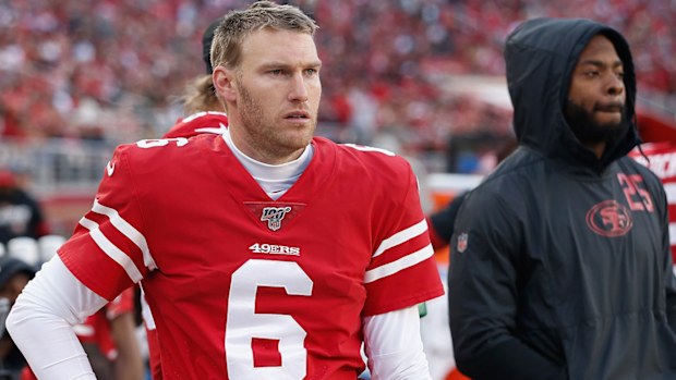 Mitch Wishnowsky and Richard Sherman on the sidelines during a 49ers game