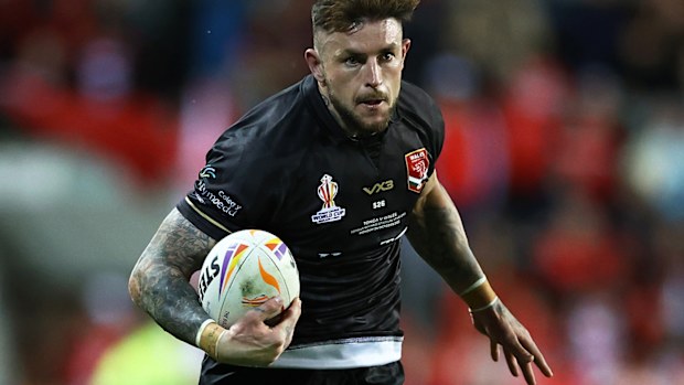 Kyle Evans scores for Wales in the Rugby League World Cup match against Tonga.