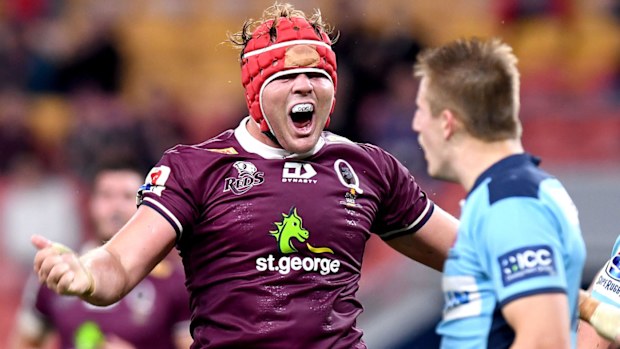 Harry Wilson of the Reds celebrates scoring a try during the round 1 Super Rugby AU match 