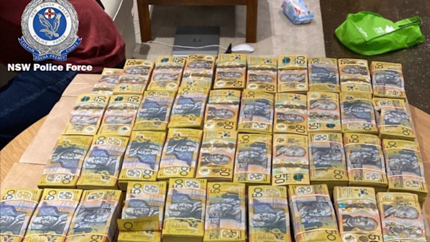 Three men have been charged with multiple offences after police busted an inner city money laundering operation.