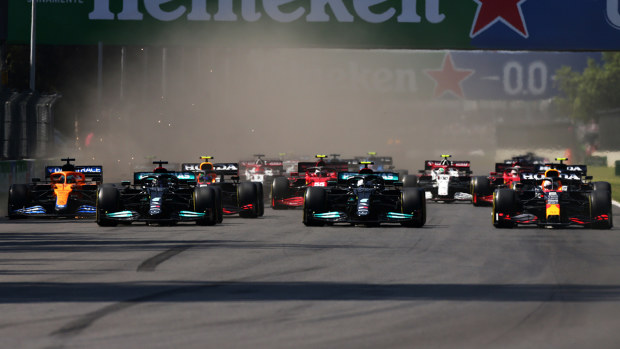 Lewis Hamilton, Valtteri Bottas and Max Verstappen are three-abreast heading into the first corner of the Mexico City Grand Prix.