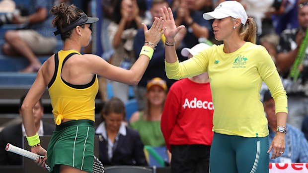 Alicia Molik, Australia Fed Cup Captain high fives Ajla Tomljanovic after winning the first set