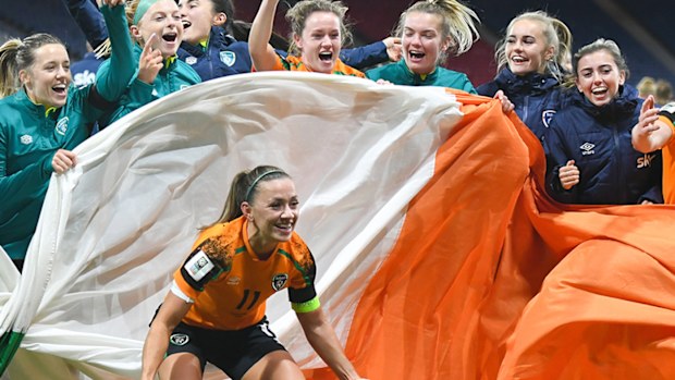 Ireland players celebrate after qualifying for the World Cup for the first time.