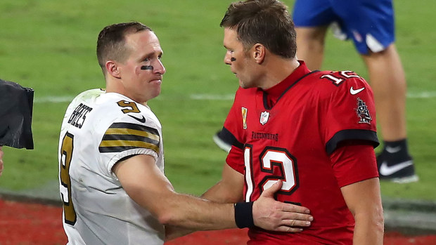 TAMPA, FL - NOVEMBER 08: Two of the greatest quarterbacks in NFL history Drew Brees (9) of the Saints and Tom Brady (12) of the Buccaneers share a few words of encouragement after the regular season game between the New Orleans Saints and the Tampa Bay Buccaneers on November 08, 2020 at Raymond James Stadium in Tampa, Florida. (Photo by Cliff Welch/Icon Sportswire via Getty Images)