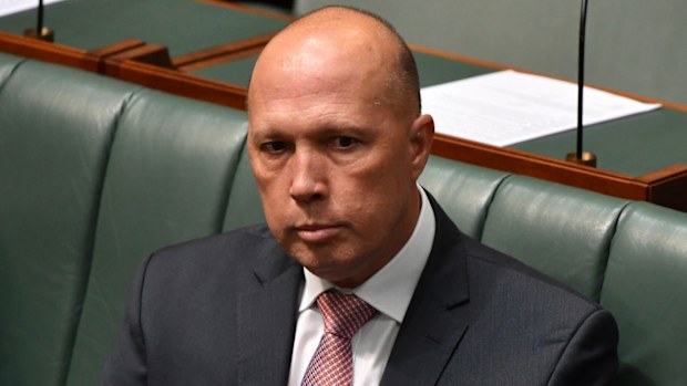 Peter Dutton said his opponent was 'using her disability as an excuse' for not moving to the electorate.
