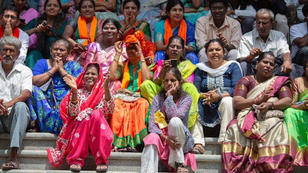 India election 2024 - Supporters of the Bharatiya Janata Party (BJP) watch a giant screen telecasting election results live on June 04, 2024 in Bengaluru, India