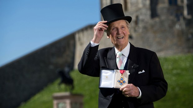 Nicholas Parsons with his Commander of the Order of the British Empire (CBE)  in 2014