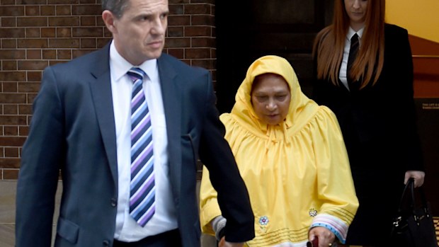 Former midwife and nurse Kubra Magennis (centre) leaves the NSW Supreme Court in Sydney. (AAP)