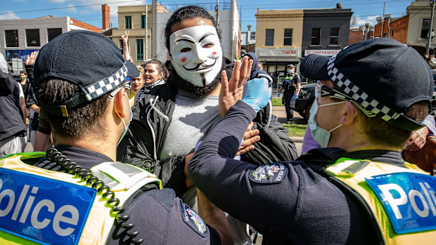 Protesters clash with Police at the Queen Victoria Market on September 13, 2020 in Melbourne, Australia. (Photo by Darrian Traynor)