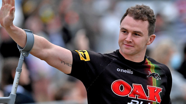 Dylan Edwards greets fans during a Penrith Panthers NRL training session