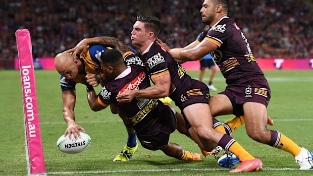 Blake Ferguson bullies his way across the line. (Getty)