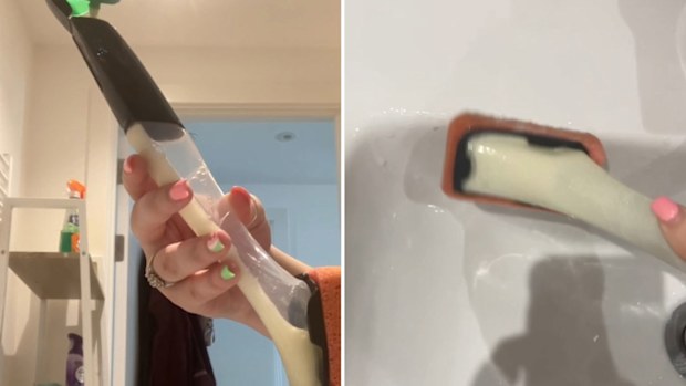 Chelsea Webster uses a dish wand with cream cleanser to clean the bathroom