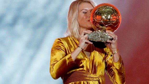 Olympique Lyonnais' Ada Hegerberg celebrates with the Women's Ballon d'Or award during the Golden Ball award ceremony at the Grand Palais in Paris.