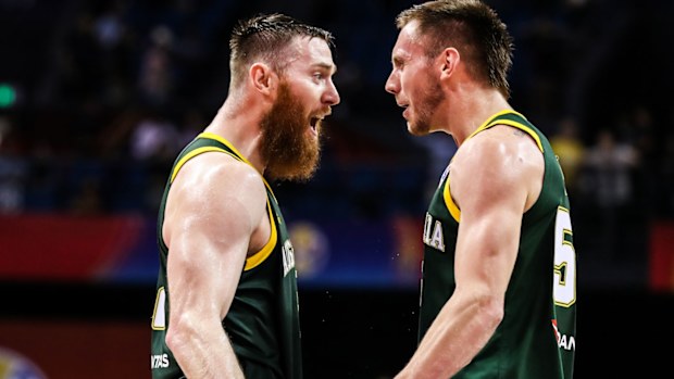 Aron Baynes(L) #12 and Mitch Creek #55 of Australia celebrate the victory