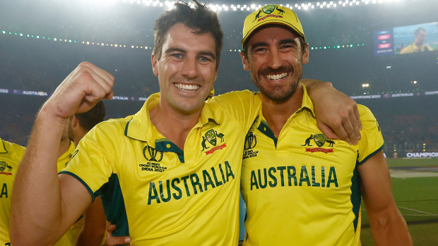 Pat Cummins and Mitchell Starc of Australia celebrates after the ICC Men's Cricket World Cup India 2023 Final between India and Australia at Narendra Modi Stadium on November 19, 2023 in Ahmedabad, India. (Photo by Darrian Traynor-ICC/ICC via Getty Images)