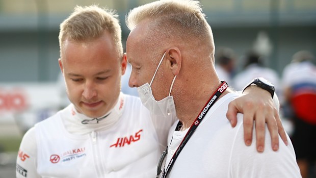 Nikita Mazepin, Haas F1, on the grid with his father Dmitry Mazepin during the Qatar GP at Losail International Circuit on Sunday November 21, 2021 in Losail, Qatar. (Photo by Andy Hone/LAT Images)