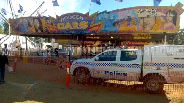 Police at the scene of the Chinchilla Show where a carnival worker has died working on dodgem cars. (Twitter/Caitlin Holding)