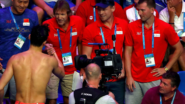 Dennis Cotterell and Sun Yang embrace in 2017.