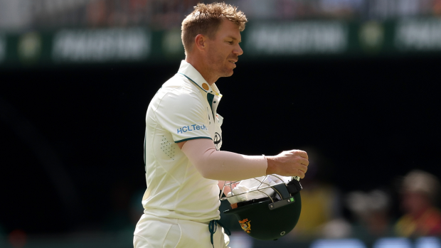 David Warner looks dejected after being dismissed by Khurram Shahzad on day three of the first Test match between Australia and Pakistan in Perth.