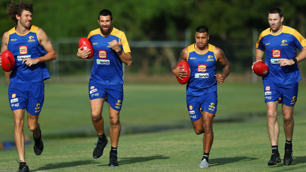 Tom Hickey, Josh Kennedy, Tim Kelly and Jeremy McGovern run during a West Coast Eagles Training Session