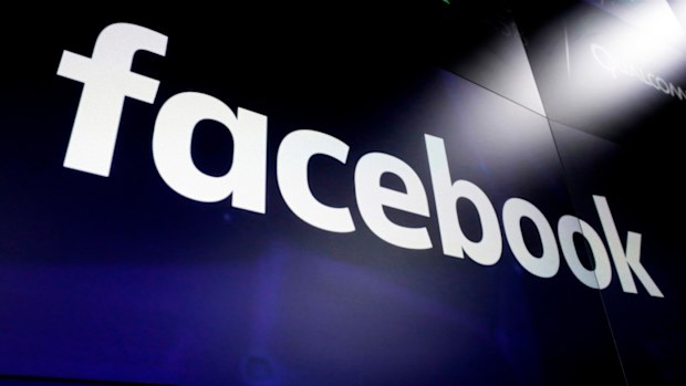 FILE - In this March 29, 2018, file photo, the logo for Facebook appears on screens in New York's Times Square.