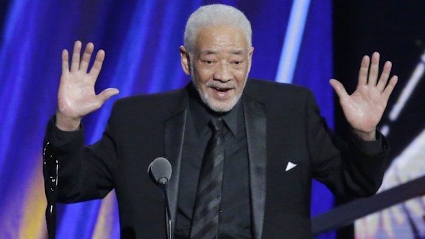 This April 18, 2015 file photo shows singer-songwriter Bill Withers speaking at the Rock and Roll Hall of Fame Induction Ceremony in Cleveland.