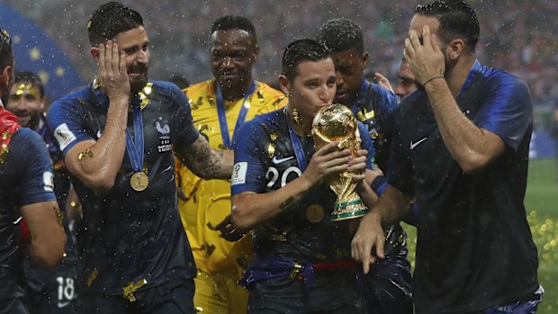 French teammates celebrate after winning the 2018 World Cup after beating Croatia.