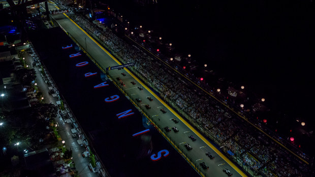 Cars leave the grid at the Singapore Grand Prix.