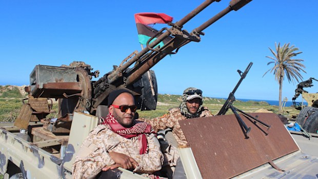 Vehicles and militants, reportedly from the Misrata militia, gather to join Tripoli forces, in Tripoli, Libya.