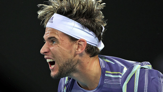 Dominic Thiem of Austria serves during his Men's Singles Semifinal match against Alexander Zverev