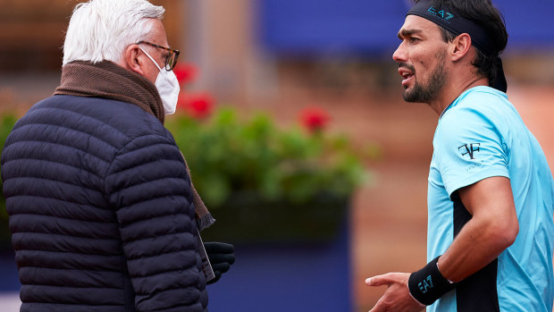 Fabio Fognini of Italy argues with the judge during his Men's Singles round of 32 match against Bernabe Zapata of Spain on day three of the Barcelona Open