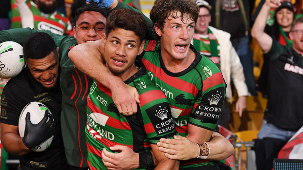 Jaxson Paulo of the Rabbitohs celebrates with team mates after scoring a try during the NRL Preliminary Final match between the South Sydney Rabbitohs and the Manly Sea Eagles at Suncorp Stadium on September 24, 2021 in Brisbane, Australia. (Photo by Bradley Kanaris/Getty Images)