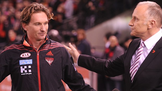 Tim Watson (R) interviews James Hird (L) during the 2013 season